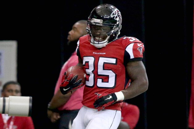 Oct 12, 2014; Atlanta, GA, USA; Atlanta Falcons running back Antone Smith (35) celebrates his touchdown reception in the third quarter of their game against the Chicago Bears at the Georgia Dome. Mandatory Credit: Jason Getz-USA TODAY Sports