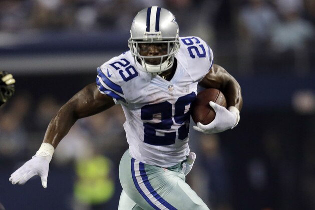 Dallas Cowboys running back DeMarco Murray (29) runs the ball against the New Orleans Saints during the second half of an NFL football game, Sunday, Sept. 28, 2014, in Arlington, Texas. (AP Photo/Tim Sharp)