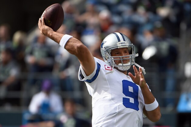 SEATTLE, WA - OCTOBER 12: quarterback Tony Romo #9 of the Dallas Cowboys warms up before the game aagainst the Seattle Seahawks at CenturyLink Field on October 12, 2014 in Seattle, Washington.  (Photo by Steve Dykes/Getty Images)