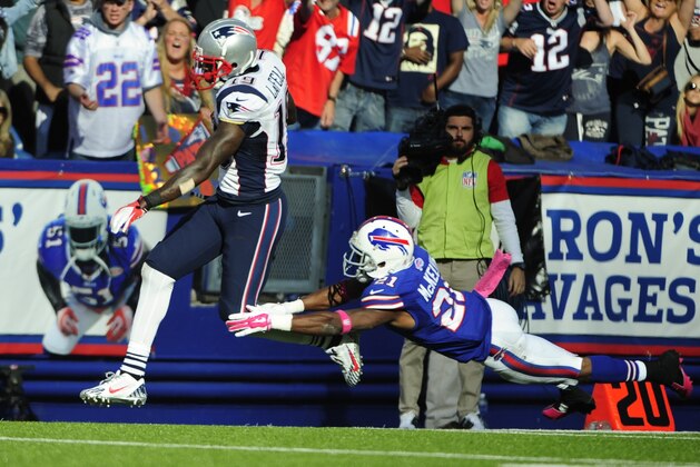 New England Patriots' Brandon LaFell (19) breaks away from Buffalo Bills' Leodis McKelvin (21) to score a touchdown during the second half of an NFL football game Sunday, Oct. 12, 2014, in Orchard Park, N.Y. The Patriots won the game 37-22. (AP Photo/Gary Wiepert)
