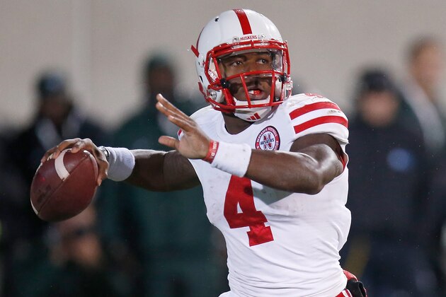 EAST LANSING, MI - OCTOBER 04: Tommy Armstrong Jr. #4 of the Nebraska Cornhuskers throws a second-quarter pass against the Michigan State Spartans at Spartan Stadium on October 4, 2014 in East Lansing, Michigan. (Photo by Gregory Shamus/Getty Images)