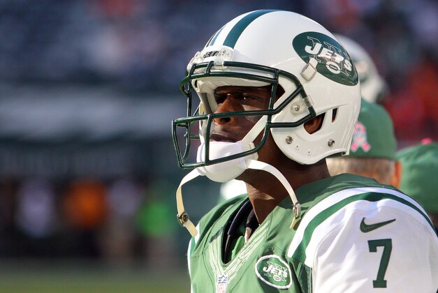 Oct 12, 2014; East Rutherford, NJ, USA; New York Jets quarterback Geno Smith (7) reacts on the sidelines during the fourth quarter against the Denver Broncos at MetLife Stadium. Mandatory Credit: Brad Penner-USA TODAY Sports