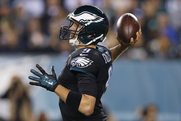 Philadelphia Eagles quarterback Nick Foles throws a pass against the New York Giants during the first half of an NFL football game, Sunday, Oct. 12, 2014, in Philadelphia. (AP Photo/Michael Perez)