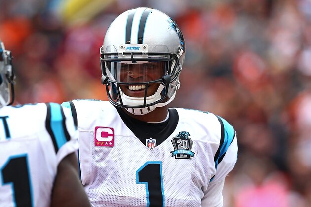 CINCINNATI, OH - OCTOBER 12:  Cam Newton #1 of the Carolina Panthers celebrates after scoring a touchdown during the third quarter against the Cincinnati Bengals at Paul Brown Stadium on October 12, 2014 in Cincinnati, Ohio. (Photo by Andy Lyons/Getty Images)