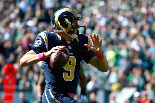 St. Louis Rams' Austin Davis scrambles during the first half of an NFL football game against the Philadelphia Eagles, Sunday, Oct. 5, 2014, in Philadelphia. (AP Photo/Matt Rourke)