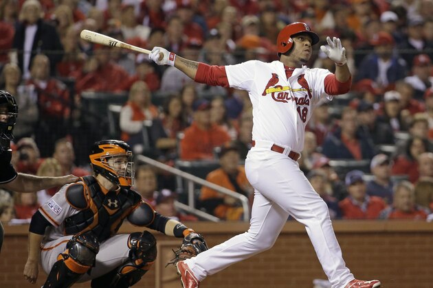 St. Louis Cardinals' Oscar Taveras hits a home run during the seventh inning in Game 2 of the National League baseball championship series against the San Francisco Giants Sunday, Oct. 12, 2014, in St. Louis. (AP Photo/David J. Phillip)
