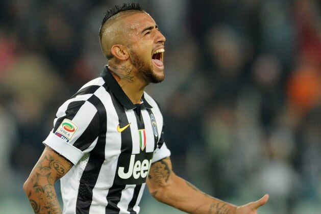 TURIN, ITALY - SEPTEMBER 24:  Arturo Vidal of Juventus FC celebrates the goal of 2-0 during the Serie A match between Juventus FC and AC Cesena at Juventus Arena on September 24, 2014 in Turin, Italy.  (Photo by Pier Marco Tacca/Getty Images)