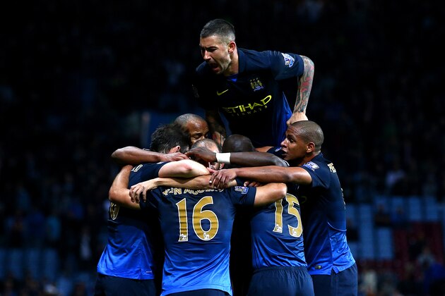 BIRMINGHAM, ENGLAND - OCTOBER 04:  Sergio Aguero of Manchester City celebrates with team-mates after scoring their second goal during the Barclays Premier League match between Aston Villa and Manchester City at Villa Park on October 4, 2014 in Birmingham, England.  (Photo by Ian Walton/Getty Images)