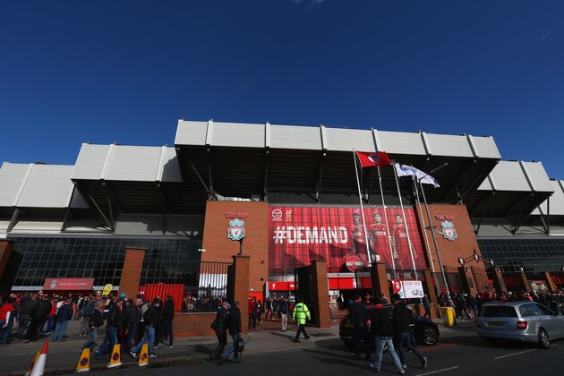 LIVERPOOL, ENGLAND - OCTOBER 04:  Fans make their way to the stadium ahead of the Barclays Premier League match between Liverpool and West Bromwich Albion at Anfield on October 4, 2014 in Liverpool, England.  (Photo by Clive Brunskill/Getty Images)