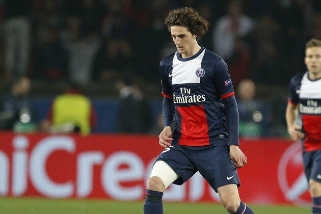 Paris Saint Germain's Adrien Rabiot, controls the ball during a Champions League last 16 second leg soccer match between Paris Saint Germain against Bayer Leverkusen at Parc des Princes stadium in Paris, Wednesday, March 12, 2014. (AP Photo/Michel Euler)