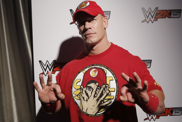 WWE 2K15 cover Superstar John Cena attends the WWE 2K15 SummerSlam Confidential Panel at Club Nokia, on Saturday, August 16, 2014 in Los Angeles. (Photo by Todd Williamson/Invision for 2K/AP Images)