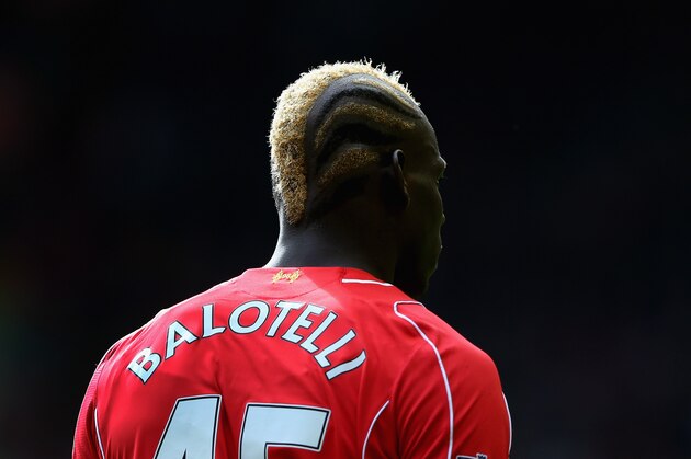 LIVERPOOL, ENGLAND - SEPTEMBER 27:  Mario Balotelli of Liverpool looks on during the Barclays Premier League match between Liverpool and Everton at Anfield on September 27, 2014 in Liverpool, England.  (Photo by Alex Livesey/Getty Images)