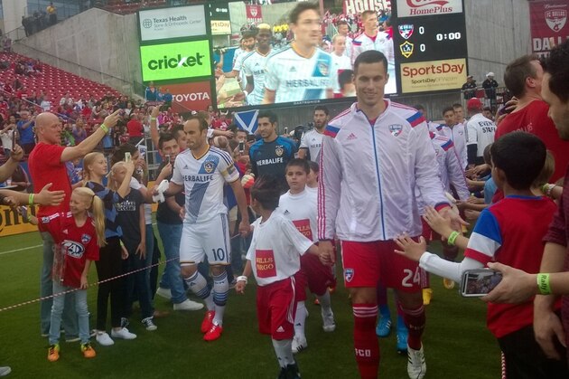 Landon Donovan enters the field for his final regular season game in Dallas.