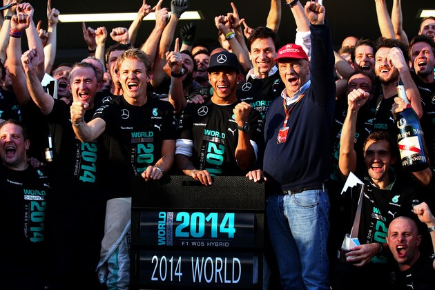 SOCHI, RUSSIA - OCTOBER 12:  Lewis Hamilton of Great Britain and Mercedes GP, Nico Rosberg of Germany and Mercedes GP, Mercedes GP Executive Director Toto Wolff and Niki Lauda, non-executive chairman of Mercedes GP celebrate with the team after becoming the 2014 World Constructors Champions during the Russian Formula One Grand Prix at Sochi Autodrom on October 12, 2014 in Sochi, Russia.  (Photo by Mark Thompson/Getty Images)