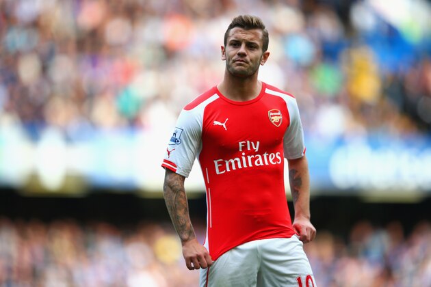 LONDON, ENGLAND - OCTOBER 05:  Jack Wilshere of Arsenal looks on during the Barclays Premier League match between Chelsea and Arsenal at Stamford Bridge on October 4, 2014 in London, England.  (Photo by Paul Gilham/Getty Images)
