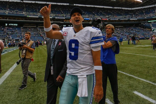 SEATTLE, WA - OCTOBER 12:  Quarterback Tony Romo #9 of the Dallas Cowboys leaves the field after a win over the Seattle Seahawks 30-23 at CenturyLink Field on October 12, 2014 in Seattle, Washington.  (Photo by Otto Greule Jr/Getty Images)