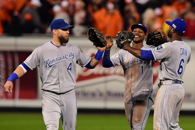 BALTIMORE, MD - OCTOBER 11:  Alex Gordon #4, Jarrod Dyson #1 and Lorenzo Cain #6 of the Kansas City Royals celebrate defeat the Baltimore Orioles 6 to 4 in Game Two of the American League Championship Series at Oriole Park at Camden Yards on October 11, 2014 in Baltimore, Maryland.  (Photo by Patrick Smith/Getty Images)