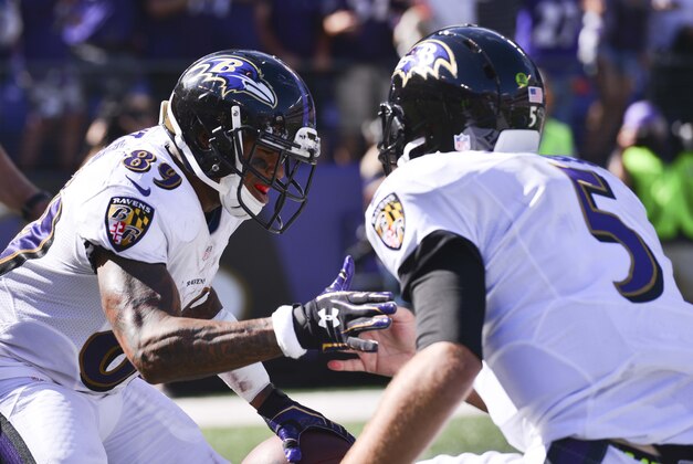 Sep 7, 2014; Baltimore, MD, USA; Baltimore Ravens wide receiver Steve Smith (89) celebrates with quarterback Joe Flacco (5) after scoring a touchdown during the fourth quarter against the Cincinnati Bengals at M&T Bank Stadium. Cincinnati Bengals defeated Baltimore Ravens 23-16. Mandatory Credit: Tommy Gilligan-USA TODAY Sports