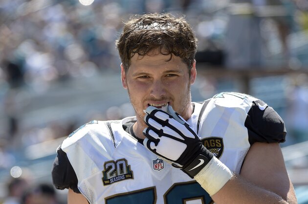 Jacksonville Jaguars offensive tackle Luke Joeckel (76) watches from the sideline during the second half of an NFL football game against the Indianapolis Colts in Jacksonville, Fla., Sunday, Sept. 21, 2014.(AP Photo/Phelan M. Ebenhack)