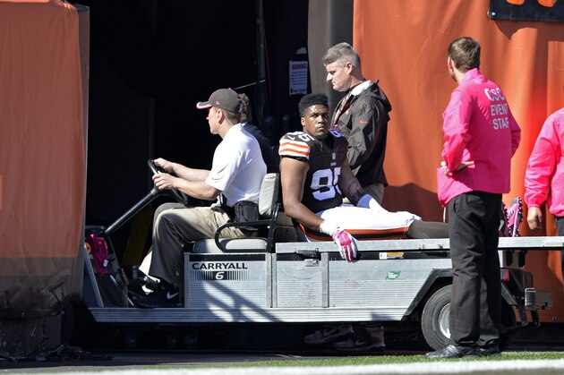 Cleveland Browns defensive end Armonty Bryant (95) is taken to the locker room after a knee injury in the first quarter of an NFL football game against the Pittsburgh Steelers Sunday, Oct. 12, 2014, in Cleveland. (AP Photo/David Richard)