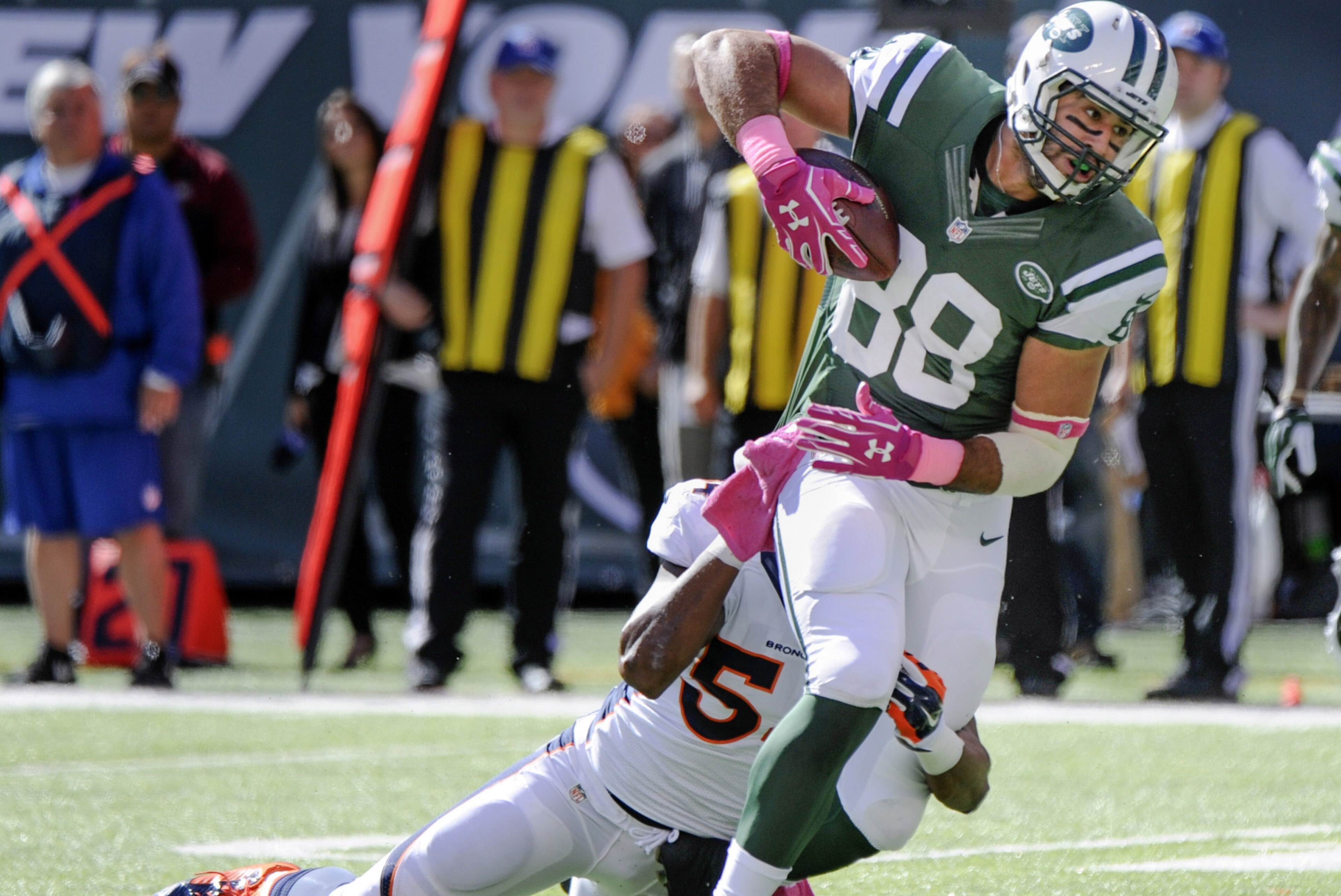 New York Jets tight end Jace Amaro (88) is tackled by Denver Broncos outside linebacker Brandon Marshall (54) in the first quarter of an NFL football game, Sunday, Oct. 12, 2014, in East Rutherford, N.J. (AP Photo/Bill Kostroun) New York Jets tight end Jace Amaro (88) is tackled by Denver Broncos outside linebacker Brandon Marshall (54) in the first quarter of an NFL football game, Sunday, Oct. 12, 2014, in East Rutherford, N.J. (AP Photo/Bill Kostroun)