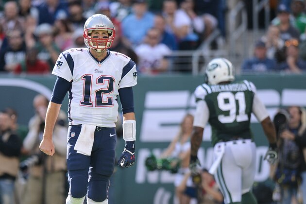 EAST RUTHERFORD, NJ - OCTOBER 20: Quarterback Tom Brady #12 of the New England Patriots reacts during the 3rd quarter of the New York Jets 30-27 win over the New England Patriots at MetLife Stadium on October 20, 2013 in East Rutherford, New Jersey. (Photo by Ron Antonelli/Getty Images)
