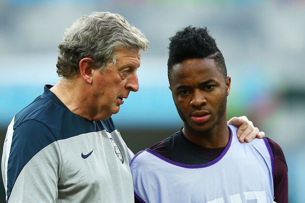 BELO HORIZONTE, BRAZIL - JUNE 23: England Manager Roy Hodgson speaks to Raheem Sterling during an England training session ahead of the 2014 FIFA World Cup Brazil Group D match against Costa Rica at Estadio Mineirao on June 23, 2014 in Belo Horizonte, Brazil.  (Photo by Richard Heathcote/Getty Images)