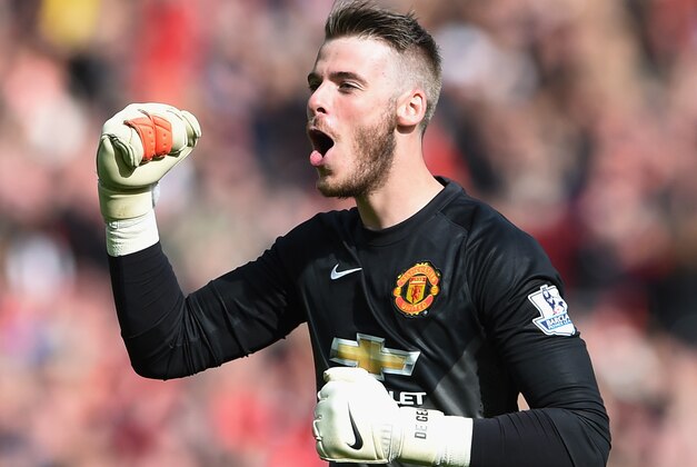 MANCHESTER, ENGLAND - OCTOBER 05:  David De Gea of Manchester United celebrates his team's second goal during the Barclays Premier League match between Manchester United and Everton at Old Trafford on October 5, 2014 in Manchester, England.  (Photo by Michael Regan/Getty Images)