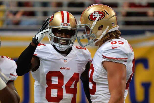 ST LOUIS, MO - OCTOBER 13:  Brandon Lloyd #84 of the San Francisco 49ers celebrates with  Vance McDonald #89 after completing a reception for an 80 yard touchdown in the second quarter against the St. Louis Rams in the second quarter at Edward Jones Dome on October 13, 2014 in St Louis, Missouri.  (Photo by Michael Thomas/Getty Images)