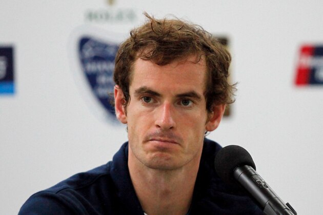 SHANGHAI, CHINA - OCTOBER 09: Andy Murray reacts to reporter's question after his match against David Ferrer of Spain during day 5 of the Shanghai Rolex Masters at Zi Zhong stadium on October 9, 2014 in Shanghai, China. David Ferrer defeats Andy Murray by 2-6, 6-1, 6-2. (Photo by Kevin Lee/Getty Images)