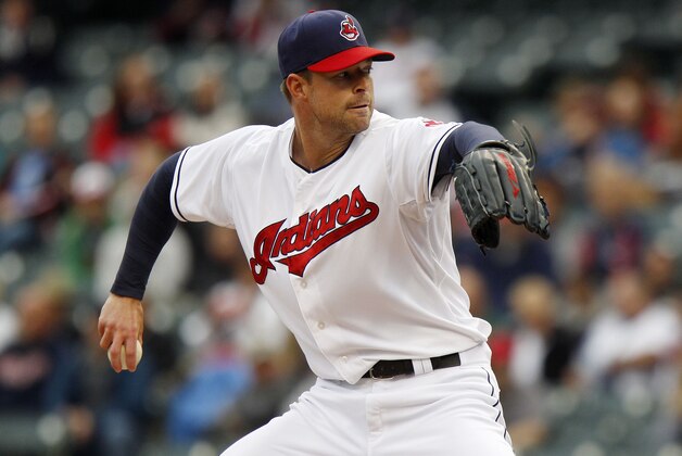CLEVELAND, OH - SEPTEMBER 11:  Corey Kluber #28 of the Cleveland Indians pitches against the Minnesota Twins during the first inning of their game on September 11, 2014 at Progressive Field in Cleveland, Ohio.(Photo by David Maxwell/Getty Images)