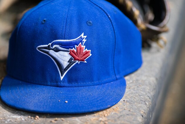 May 16, 2014; Arlington, TX, USA; A view of a Toronto Blue Jays ball cap and logo during the game between the Texas Rangers and the Blue Jays at Globe Life Park in Arlington. The Blue Jays shut out the Rangers 2-0. Mandatory Credit: Jerome Miron-USA TODAY Sports