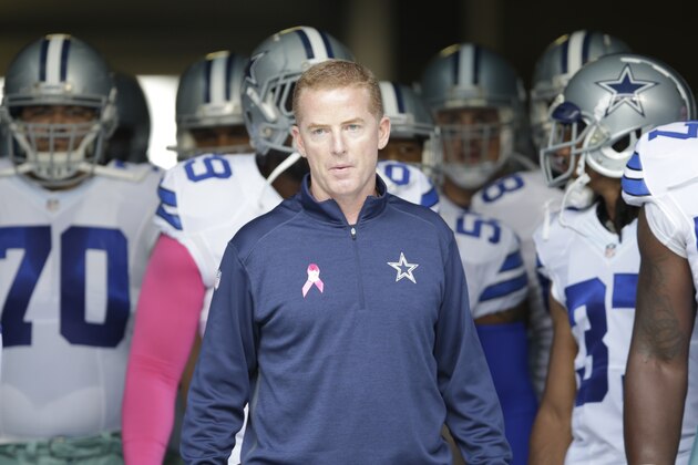 Dallas Cowboys head coach Jason Garrett walks out to the field prior to the start of  an NFL football game against the Seattle Seahawks, Sunday, Oct. 12, 2014, in Seattle. (AP Photo/Scott Eklund)