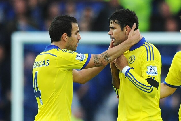 LIVERPOOL, ENGLAND - AUGUST 30:  Diego Costa of Chelsea exchanges words with Cesc Fabregas of Chelsea during the Barclays Premier League match between Everton and Chelsea at Goodison Park on August 30, 2014 in Liverpool, England.  (Photo by Chris Brunskill/Getty Images)