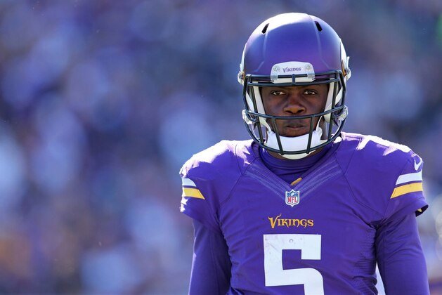 Oct 12, 2014; Minneapolis, MN, USA; Minnesota Vikings quarterback Teddy Bridgewater (5) looks on during the second quarter against the Detroit Lions at TCF Bank Stadium. The Lions defeated the Vikings 17-3. Mandatory Credit: Brace Hemmelgarn-USA TODAY Sports