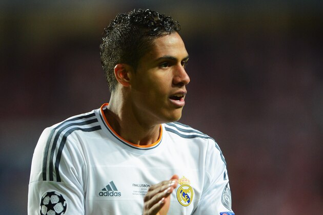 LISBON, PORTUGAL - MAY 24:  Raphael Varane of Real Madrid applauds during the UEFA Champions League Final between Real Madrid and Atletico de Madrid at Estadio da Luz on May 24, 2014 in Lisbon, Portugal.  (Photo by Michael Regan/Getty Images)