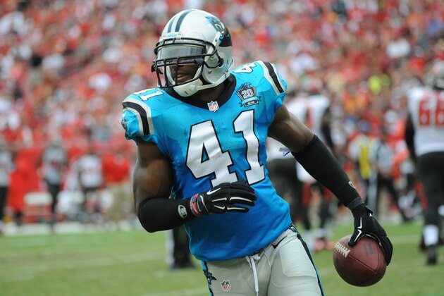 TAMPA, FL - SEPTEMBER 7:  Strong safety Roman Harper #41 of the Carolina Panthers heads to the bench after making an interception against the Tampa Bay Buccaneers at Raymond James Stadium on September 7, 2014 in Tampa, Florida. (Photo by Cliff McBride/Getty Images)