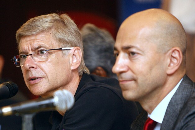 Arsenal's manager Arsene Wenger, left, speaks as chief executive Ivan Gazidis listens during a press conference in Kuala Lumpur, Malaysia, Sunday, July 22, 2012. Arsenal will play the Malaysian XI, a Malaysia League selection, on Tuesday as part of their Asia tour. (AP Photo/Lai Seng Sin)