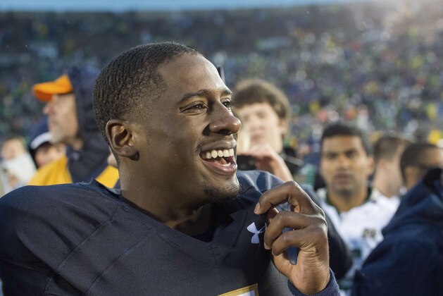 Oct 4, 2014; South Bend, IN, USA; Notre Dame Fighting Irish quarterback Everett Golson (5) smiles after Notre Dame defeated the Stanford Cardinal 17-14 at Notre Dame Stadium. Mandatory Credit: Matt Cashore-USA TODAY Sports