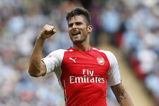 Arsenal's Olivier Giroud celebrates his goal against Manchester City during their English Community Shield soccer match at Wembley Stadium in London, Sunday, Aug. 10, 2014. (AP Photo/Sang Tan)