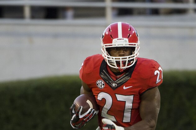 Georgia running back Nick Chubb (27) runs in the second  half of an NCAA college football game against Vanderbilt  Saturday, Oct. 4, 2014, in Athens, Ga.. Georgia won 44-17. (AP Photo/John Bazemore)