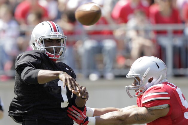 Ohio State quarterback JT Barrett throws a pass during their spring NCAA college football game Saturday, April 12, 2014, in Columbus, Ohio. (AP Photo/Jay LaPrete)