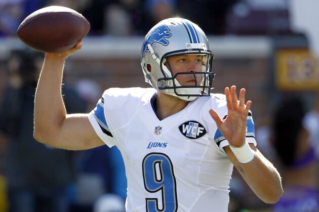Detroit Lions quarterback Matthew Stafford prepares to throw during the first half of an NFL football game against the Minnesota Vikings, Sunday, Oct. 12, 2014, in Minneapolis. (AP Photo/Ann Heisenfelt)