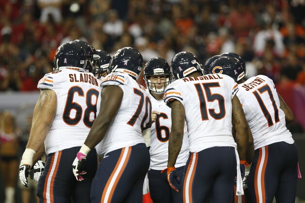 Chicago Bears quarterback Jay Cutler (6) calls a play in huddle against the Atlanta Falcons during the second half of an NFL football game, Sunday, Oct. 12, 2014, in Atlanta. (AP Photo/Brynn Anderson )