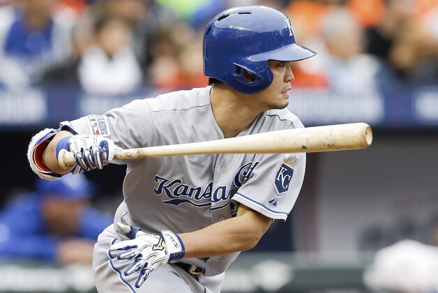 Kansas City Royals' Norichika Aoki hits a single during the first inning of Game 2 of the American League baseball championship series against the Baltimore Orioles Saturday, Oct. 11, 2014, in Baltimore. (AP Photo/Patrick Semansky)