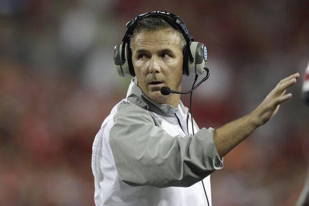 Ohio State head coach Urban Meyer on the sidelines against Virginia Tech during an NCAA college football game Saturday, Sept. 6, 2014, in Columbus, Ohio. (AP Photo/Jay LaPrete)