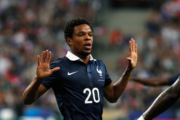 France's Loic Remy celebrates scoring a goal during his international friendly soccer match against Spain at the Stade de France in Saint Denis, outside Paris, Thursday, Sept. 4, 2014. (AP Photo/Thibault Camus)