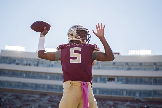 TALLAHASSEE, FL - OCTOBER 4: Quarterback Jameis Winston #5 of the Florida State Seminoles warms up prior to the game against the Wake Forest Demon Deacons at Doak Campbell Stadium on October 4, 2014 in Tallahassee, Florida.  (Photo by Jeff Gammons/Getty Images)