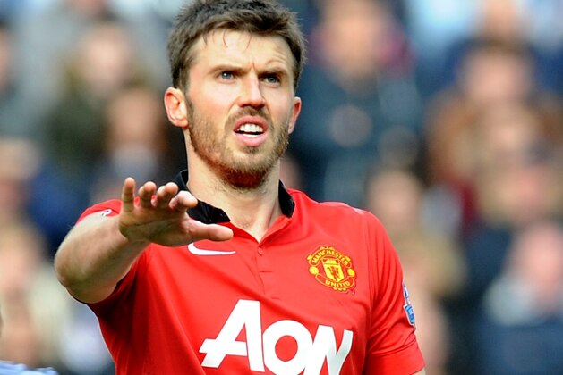 Manchester United's Michael Carrick during the English Premier League soccer match between West Bromwich Albion and Manchester United at The Hawthorns Stadium in West Bromwich, England, Saturday, March 8, 2014.  (AP Photo/Rui Vieira)