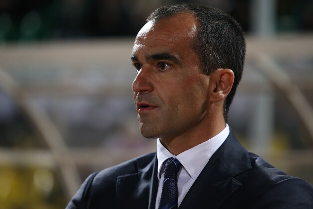Everton's coach Roberto Martinez watches  the Europa League Group H soccer match between Krasnodar and Everton in Krasnodar, Russia, Thursday, Oct. 2, 2014. (AP Photo/Vitaly Timkiv)